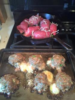 Browning the Braciole and Mozzarella stuffed Meatballs.